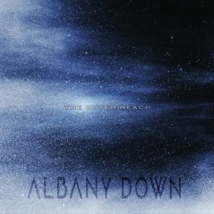 A misty, gassy area of space with stars in the background. Faint text in the middle says "The Outer Reach" and at the bottom, slightly more visible is the newest Albany Down wordmark.